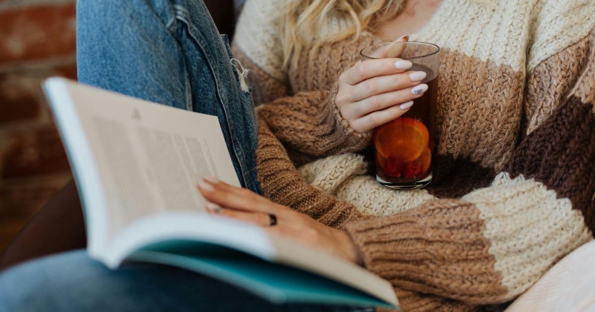 Nursing student reading a book